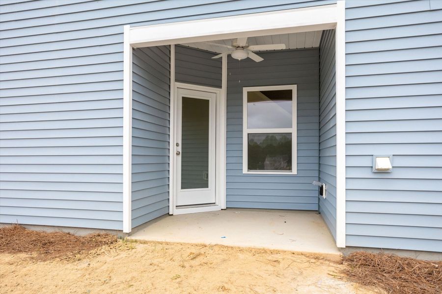 Exterior details and patio area of a home in Cambridge Reserve, Angier (Image 3).