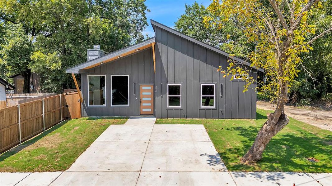 Front exterior of a new home in , Greenville, TX, highlighting curb appeal (Image 1). Front exterior of a new home in , Greenville, TX, highlighting curb appeal (Image 1).