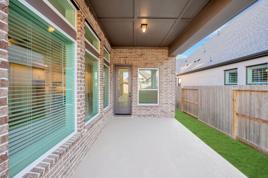 Exterior details and patio area of a home in Riceland - Enclave Collection, Mont Belvieu (Image 3).