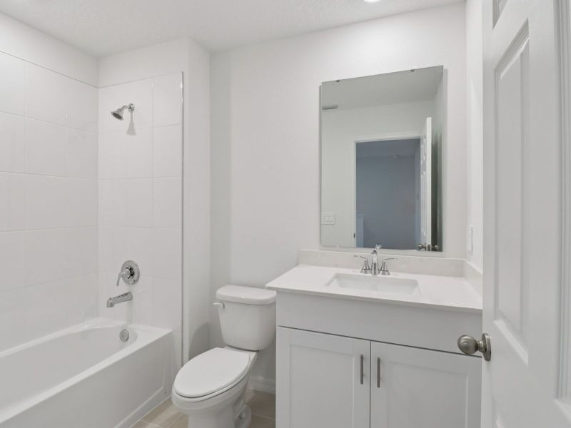 Furnished interior view inside a new home in Cagan Crossings West, Clermont (Image 7).