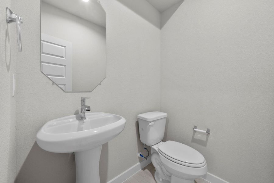 Furnished interior view inside a new home in Barton Creek Ranch, Conroe (Image 14).