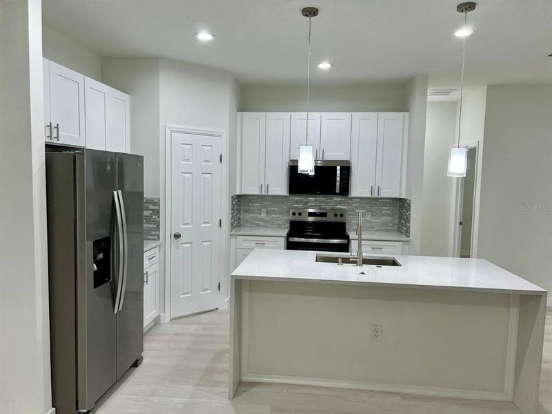 Furnished interior view inside a new home in , Palm Bay (Image 6). Furnished interior view inside a new home in , Palm Bay (Image 6).