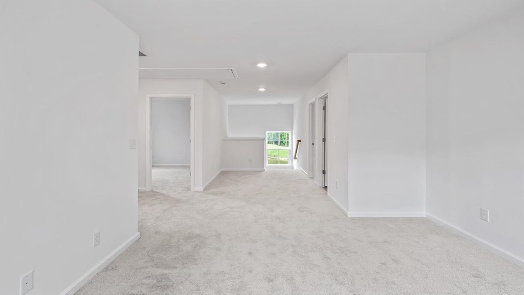 Spacious, unfurnished interior of a new home in Creekside at Andrews, Summerville (Image 13).