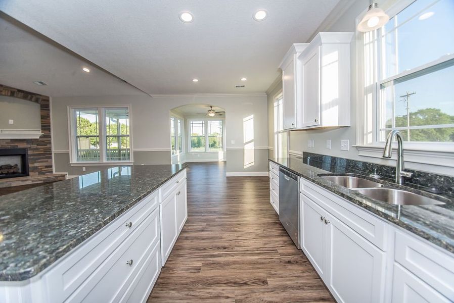 Representative furnished interior of a home built from the Mediterranean by Enchanted Homes in Messer Farms, Inman (Image 10).