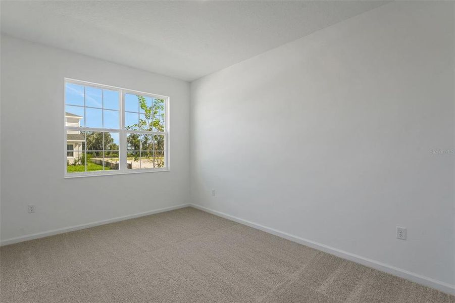 Spacious, unfurnished interior of a new home in Willowbrook North, Winter Haven (Image 22).