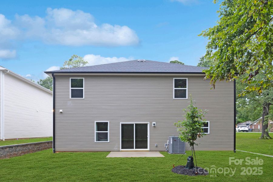Front exterior of a new home in , Huntersville, NC, highlighting curb appeal (Image 1). Front exterior of a new home in , Huntersville, NC, highlighting curb appeal (Image 1).