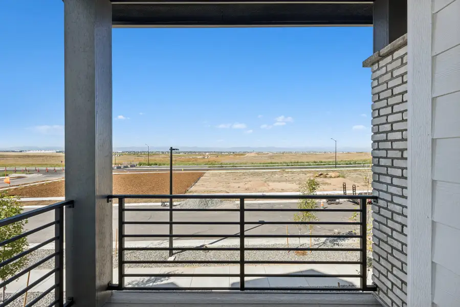 Exterior details and patio area of a home in The Aurora Highlands Pinnacle Collection, Aurora (Image 3).