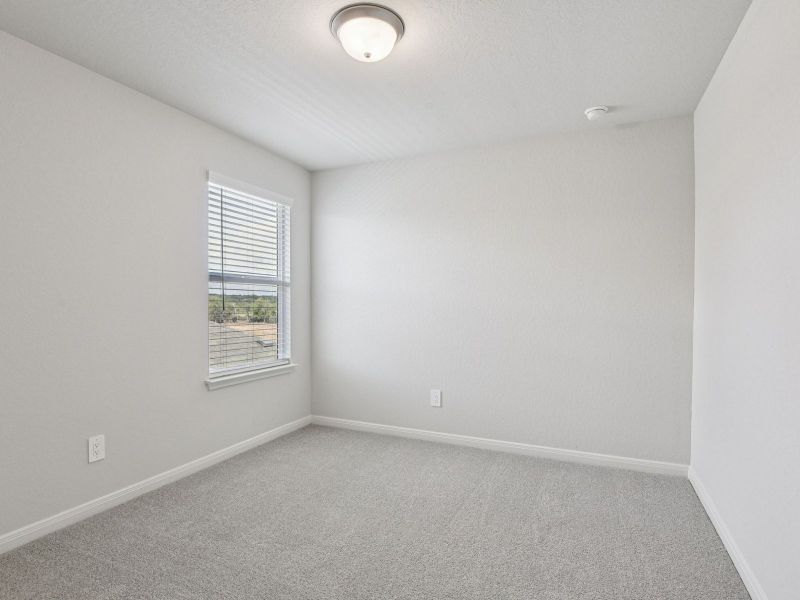 Spacious, unfurnished interior of a new home in Remington Ranch, San Antonio (Image 32).