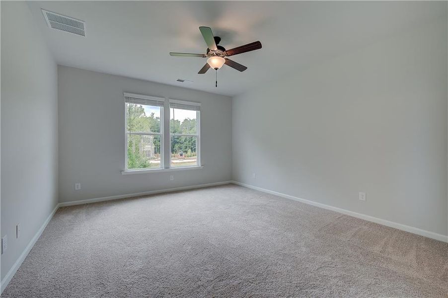 Spacious, unfurnished interior of a new home in Northcroft, Loganville (Image 25).