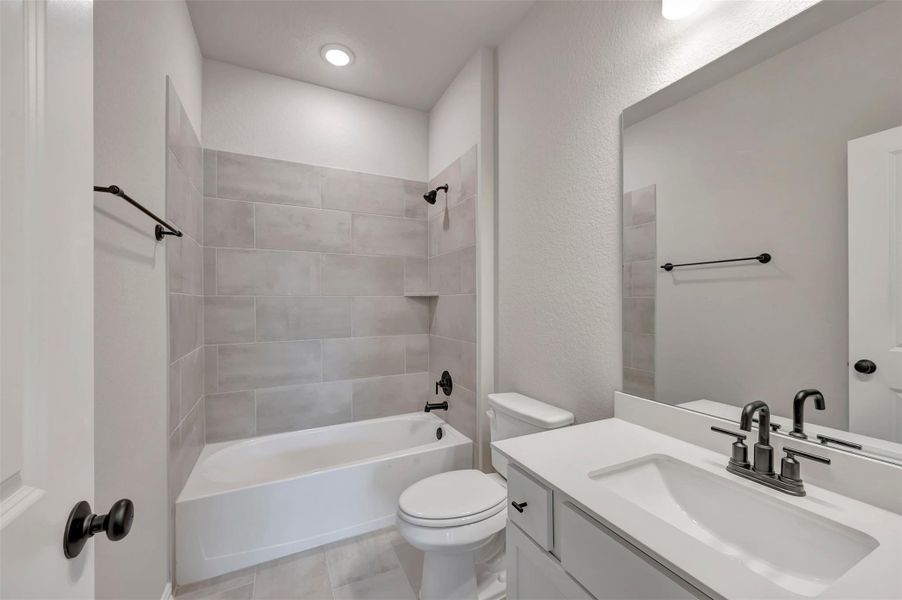 Furnished interior view inside a new home in Heritage, Dripping Springs (Image 8).