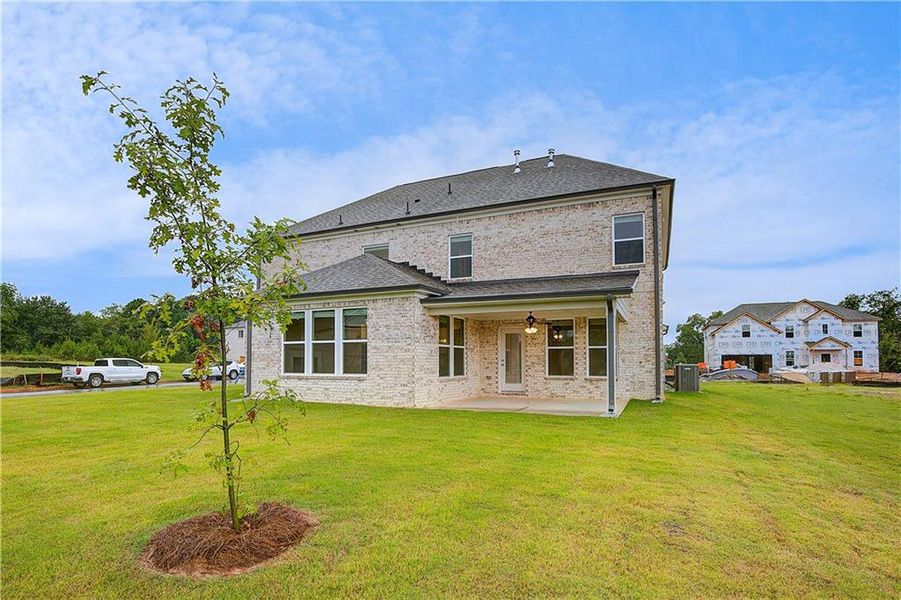 Front exterior of a new home in Westwind Estates, Hampton, GA, highlighting curb appeal (Image 19).