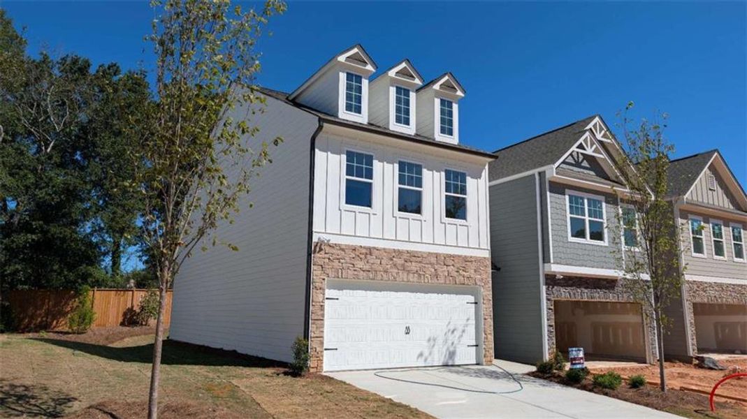 Front exterior of a new home in Owen Preserve, Canton, GA, highlighting curb appeal (Image 21).