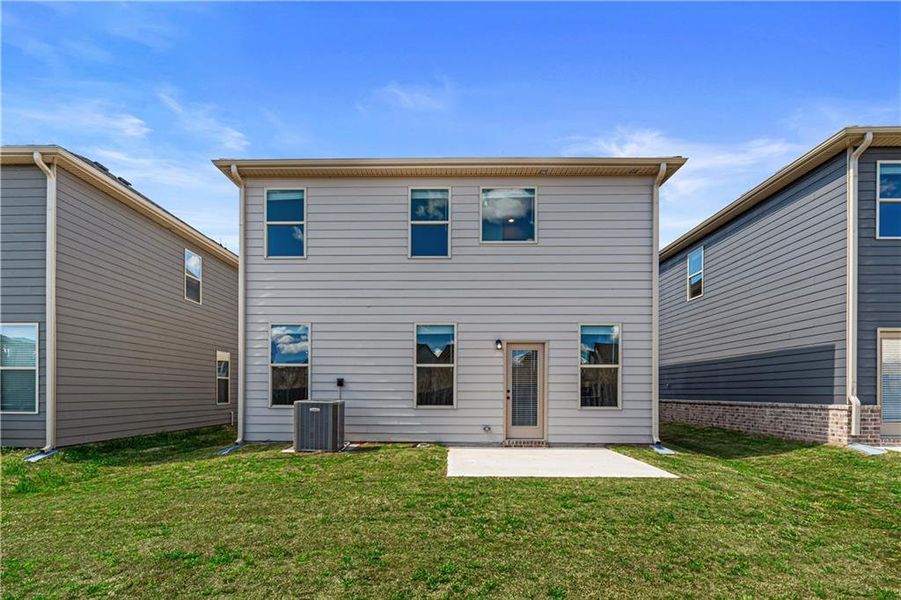 Exterior details and patio area of a home in Towne Center, Hampton (Image 3).