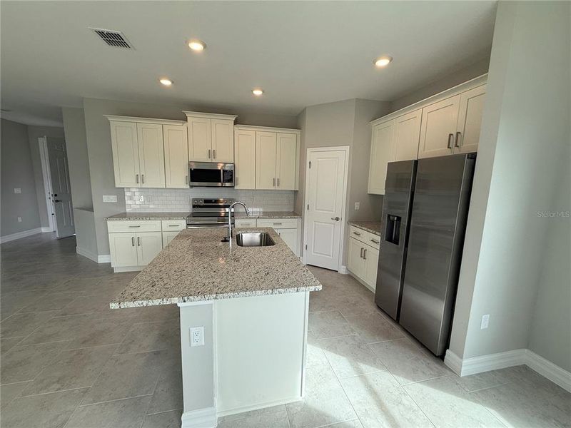Furnished interior view inside a new home in , North Port (Image 12).