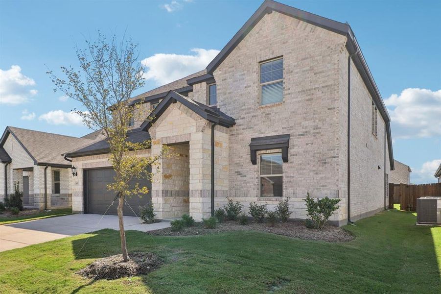 Front exterior of a new home in Southridge - Signature Series, Princeton, TX, highlighting curb appeal (Image 2). Front exterior of a new home in Southridge - Signature Series, Princeton, TX, highlighting curb appeal (Image 2).