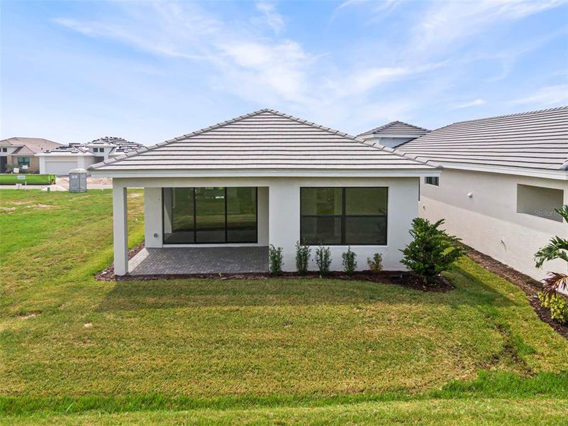 Exterior details and patio area of a home in Cresswind Lakewood Ranch, Lakewood Ranch (Image 15).