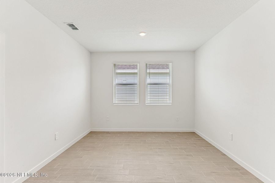 Spacious, unfurnished interior of a new home in Cypress Meadows - Signature Series, Jacksonville (Image 18).