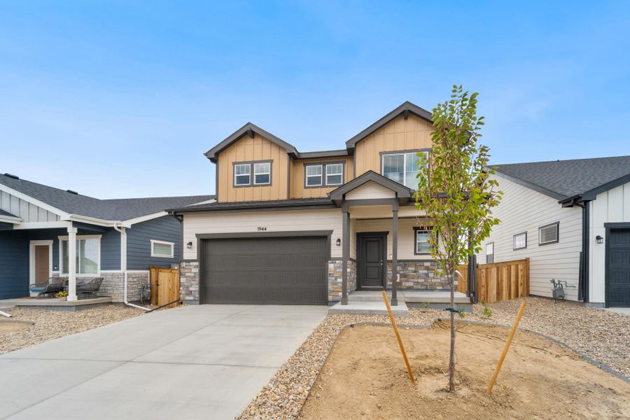 Front exterior of a new home in Granary, Johnstown, CO, highlighting curb appeal (Image 16).