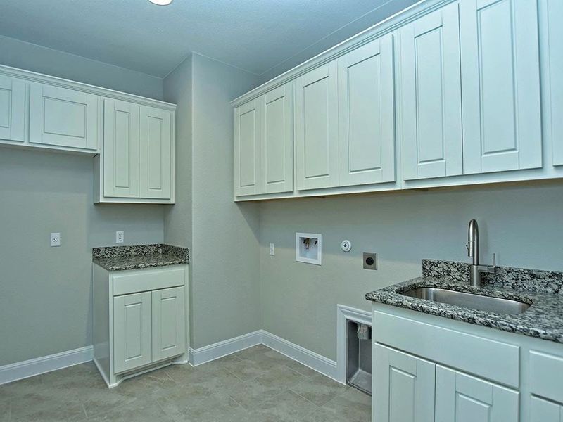 Image 209 representing the Santa Barbara II by Giddens Homes in Scofield Farms Estates, Georgetown, TX.