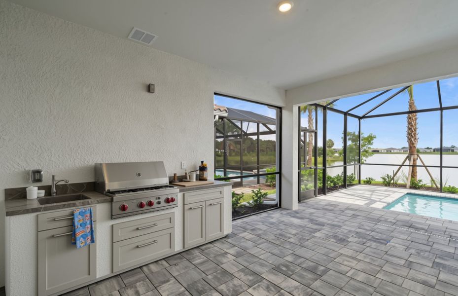 Exterior details and patio area of a home in Del Webb Oak Creek, North Fort Myers (Image 23).