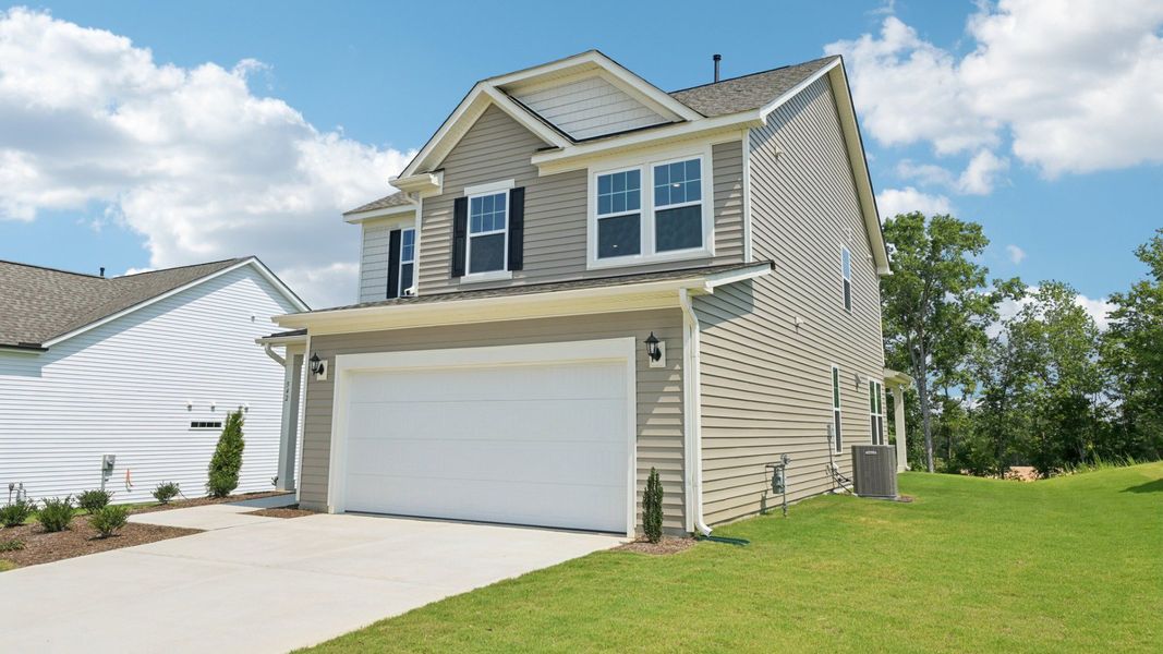 Front exterior of a new home in The Farm at Neill's Creek, Lillington, NC, highlighting curb appeal (Image 2).