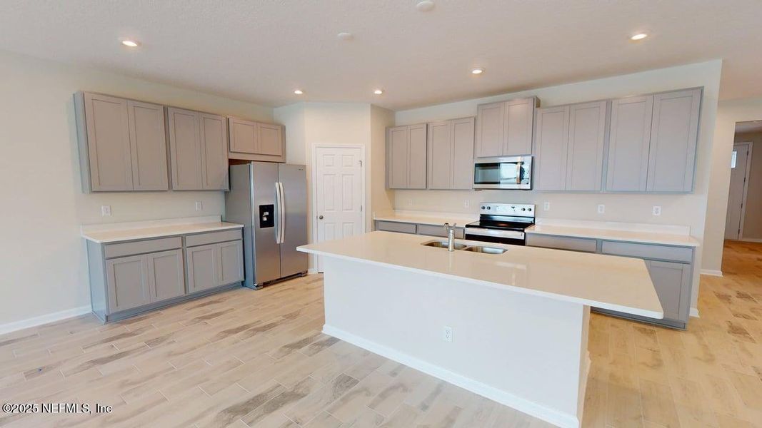 Furnished interior view inside a new home in Sandridge Hills, Green Cove Springs (Image 3).