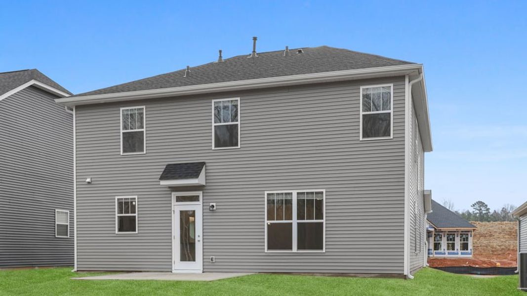 Exterior details and patio area of a home in Briargate, Fountain Inn (Image 18).