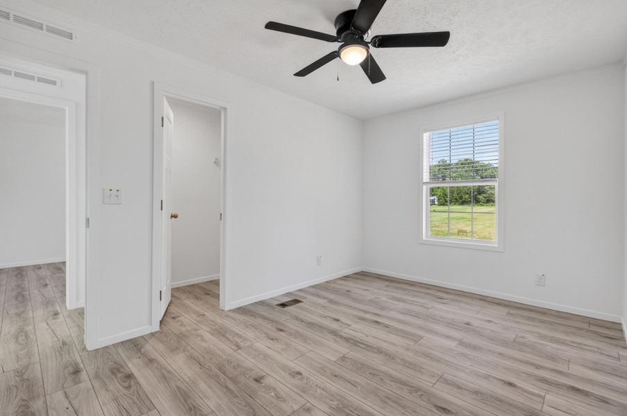 Spacious, unfurnished interior of a new home in , Cross (Image 36).