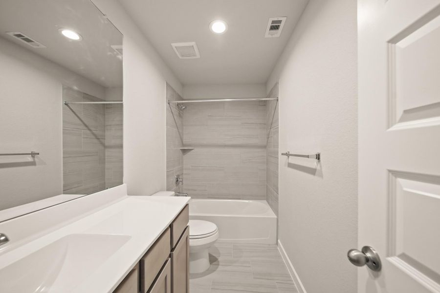 Furnished interior view inside a new home in Beacon Hill, Waller (Image 3). Furnished interior view inside a new home in Beacon Hill, Waller (Image 3).