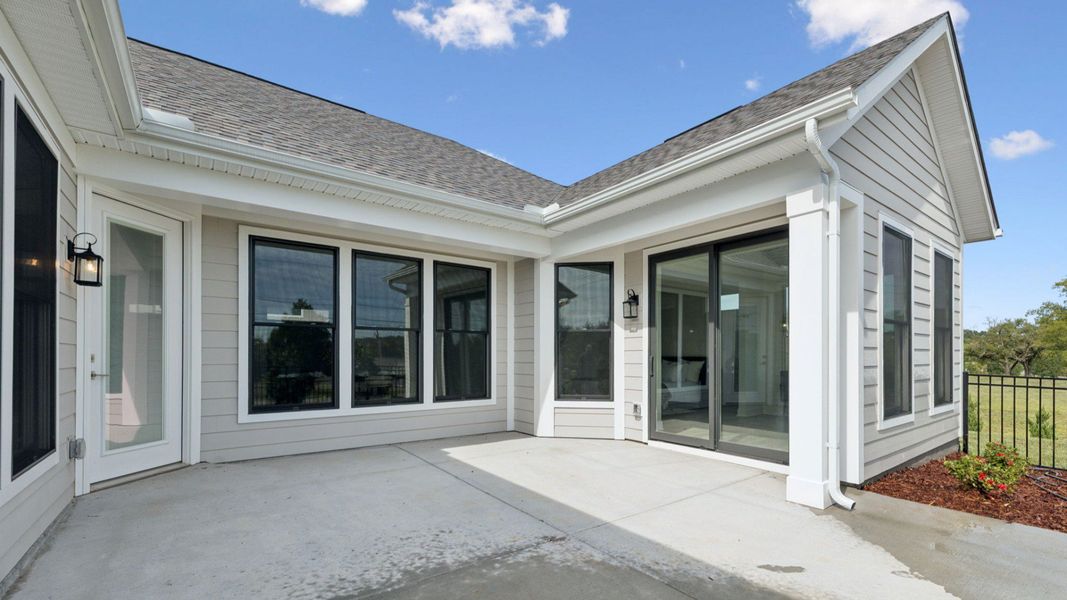Exterior details and patio area of a home in The Courtyards at Stewarts Creek, Smyrna (Image 2).