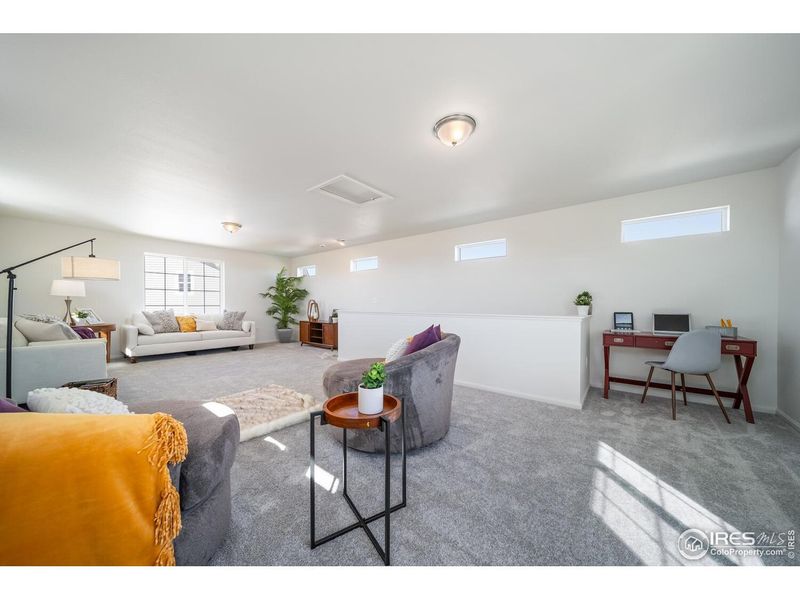 Furnished interior view inside a new home in Thompson River Ranch, Johnstown (Image 24).