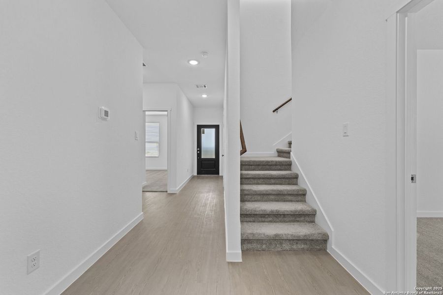 Spacious, unfurnished interior of a new home in Waterwheel: Coastline Collection, San Antonio (Image 12).