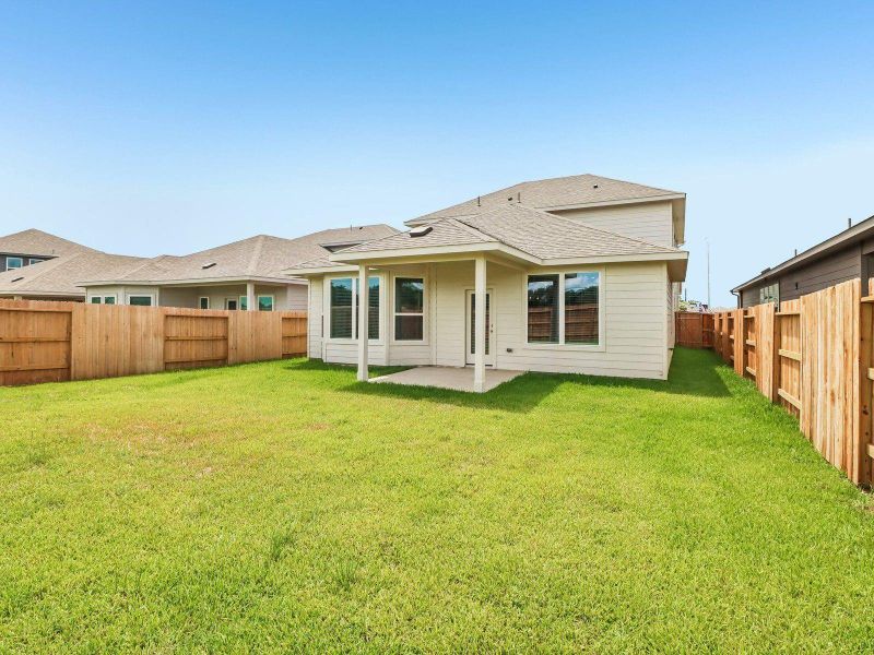Exterior details and patio area of a home in Sanford Farms - Premier Series, Waller (Image 24).