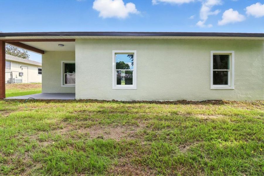 Front exterior of a new home in , Citrus Springs, FL, highlighting curb appeal (Image 17).