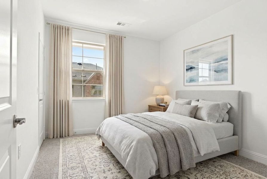 Furnished interior view inside a new home in The Tribute, The Colony (Image 31).