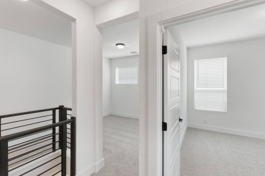 Spacious, unfurnished interior of a new home in Centero at Stone Oak, San Antonio (Image 30).