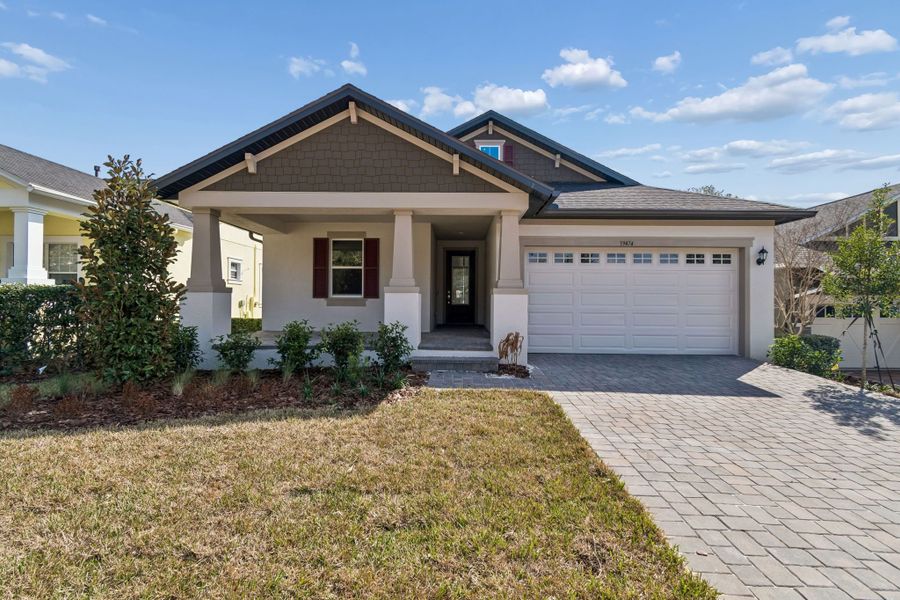 Front exterior of a new home in Southern Hills Plantation, Brooksville, FL, highlighting curb appeal (Image 26).