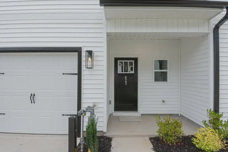 Exterior details and patio area of a home in Parkstone Place Townhomes, Roebuck (Image 2). Exterior details and patio area of a home in Parkstone Place Townhomes, Roebuck (Image 2).