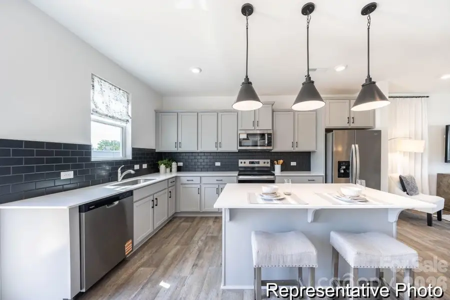 Furnished interior view inside a new home in , Concord (Image 7).