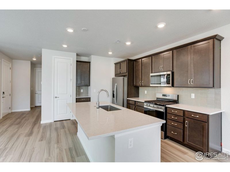 Furnished interior view inside a new home in Westside Crossing, Berthoud (Image 11).