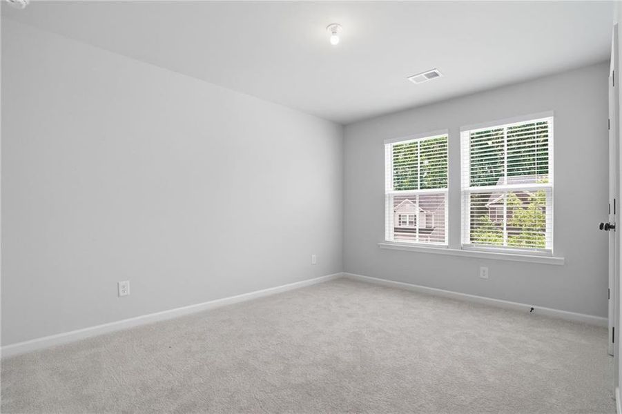 Spacious, unfurnished interior of a new home in Berkeley Mill, Cumming (Image 33).
