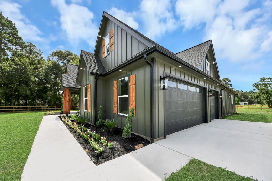Front exterior of a new home in , Plantersville, TX, highlighting curb appeal (Image 32). Front exterior of a new home in , Plantersville, TX, highlighting curb appeal (Image 32).