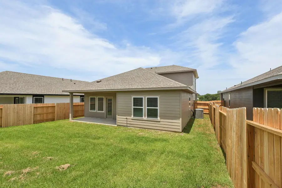 Front exterior of a new home in Pine Lake Cove - Premier Series, Montgomery, TX, highlighting curb appeal (Image 5).