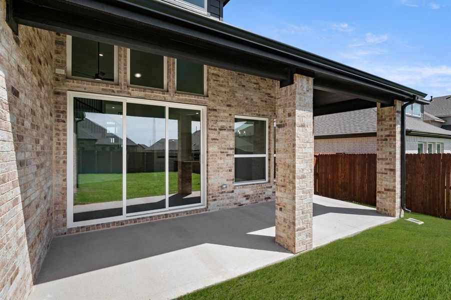 Exterior details and patio area of a home in Westside Preserve, Midlothian (Image 3).