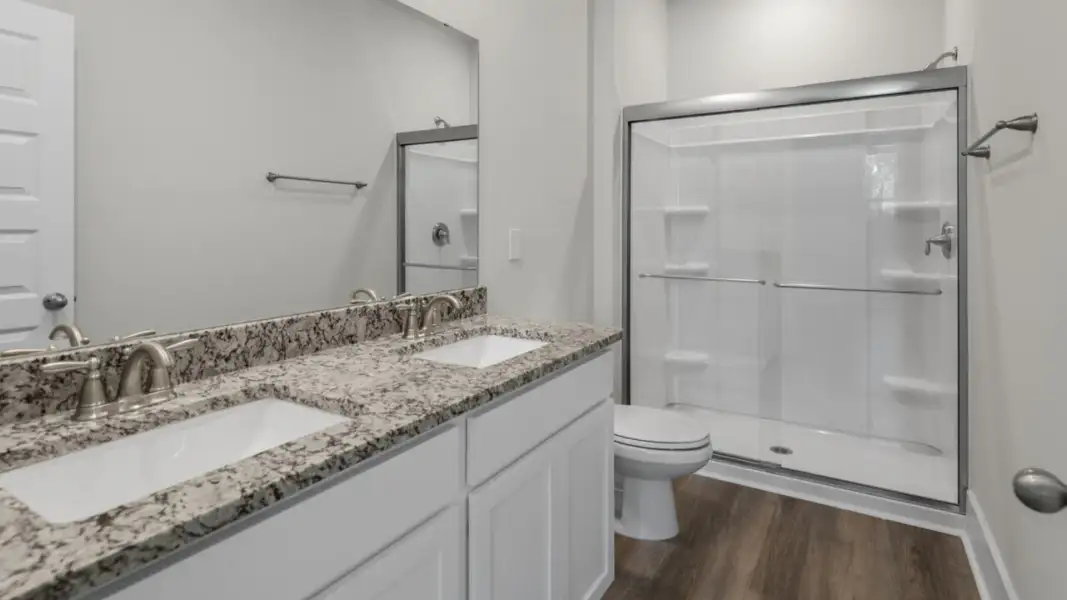 Furnished interior view inside a new home in The Retreat at Indigo Preserve Townhomes, Leland (Image 10).
