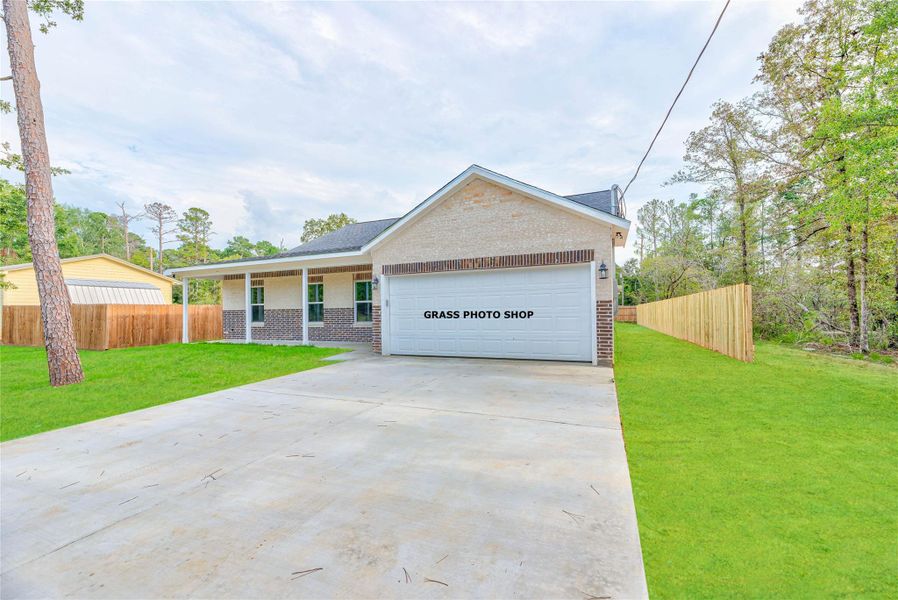 Front exterior of a new home in , Onalaska, TX, highlighting curb appeal (Image 18).
