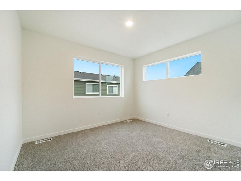 Spacious, unfurnished interior of a new home in Liberty Draw, Evans (Image 14).