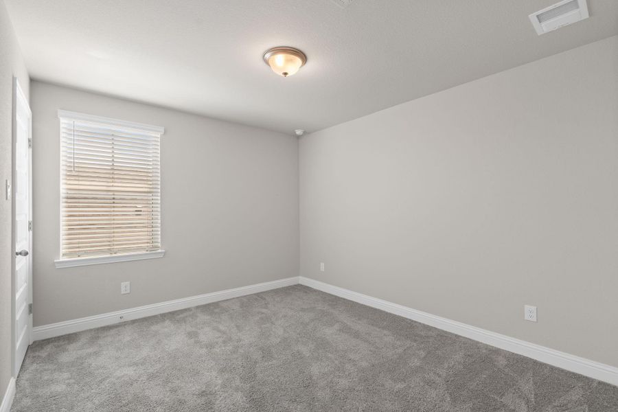 Spacious, unfurnished interior of a new home in Sunterra, Katy (Image 29).