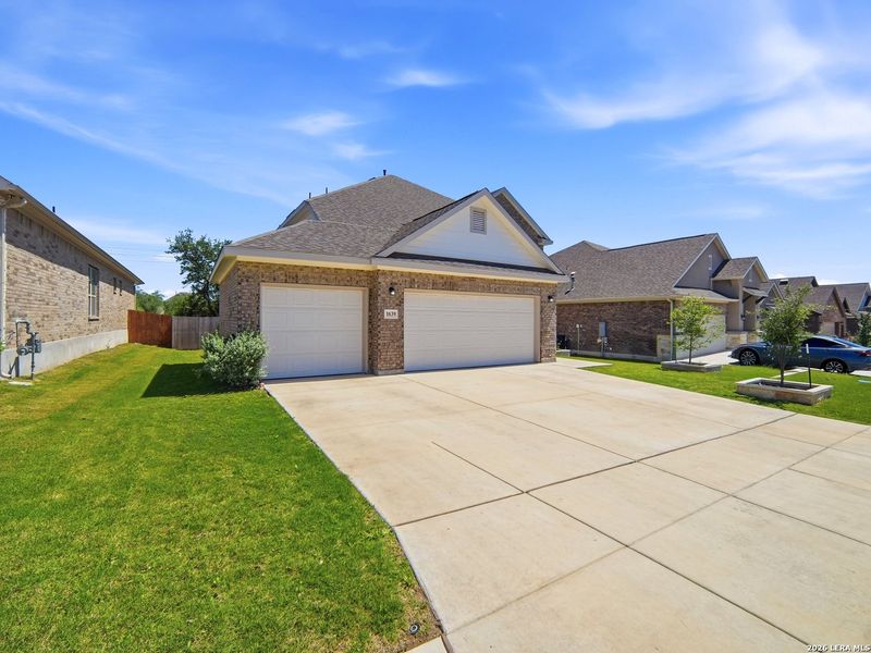 Front exterior of a new home in Ventana, Bulverde, TX, highlighting curb appeal (Image 23).