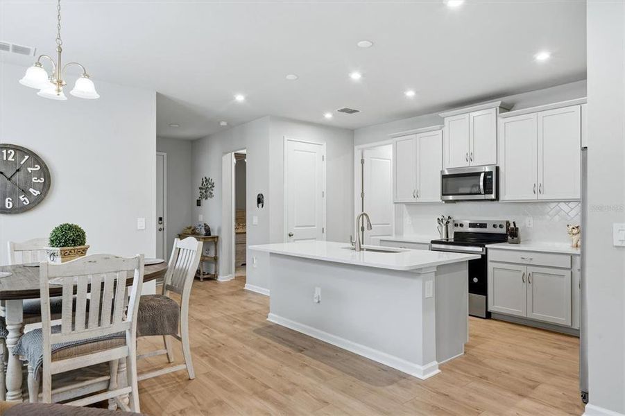 Furnished interior view inside a new home in Wellen Park, Venice (Image 9).